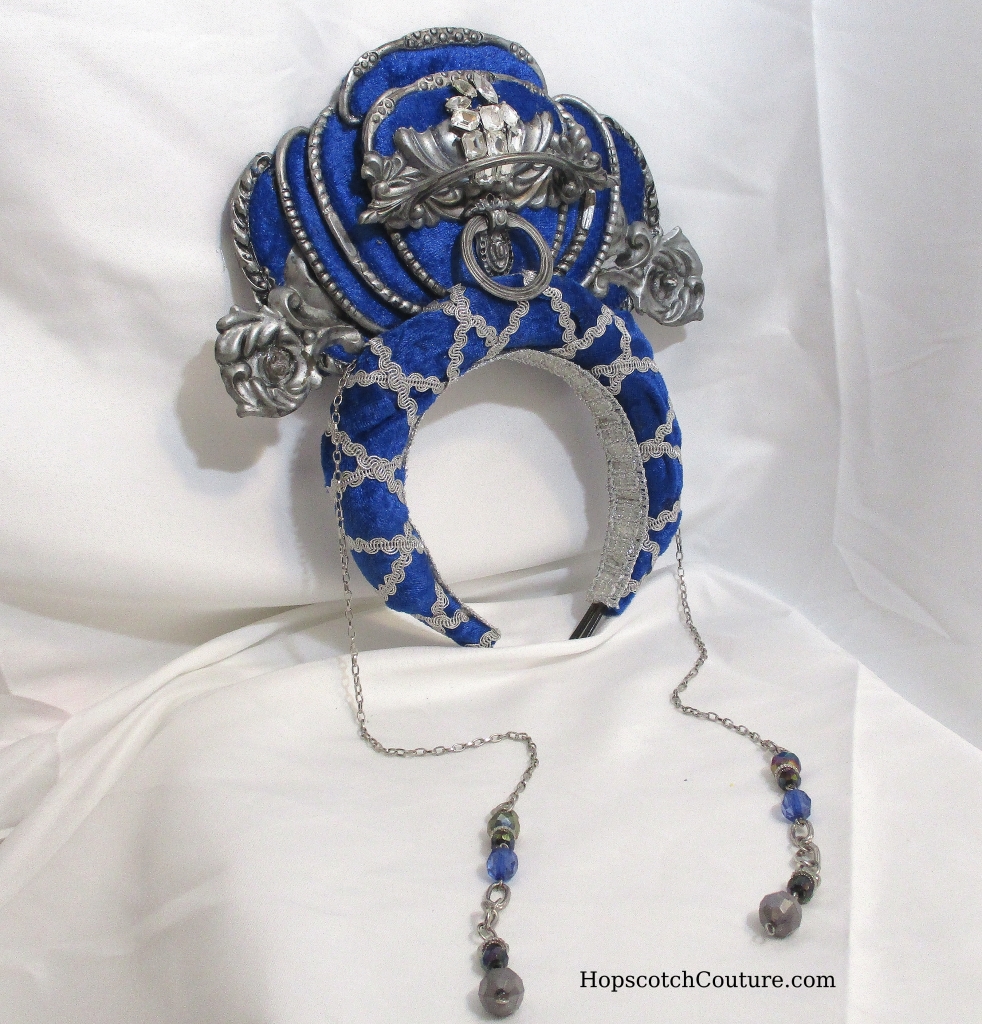 Front view of royal blue headband crown handmade by Marelle Couture for Hopscotch Couture. https://hopscotchcouture.com/products/royal-blue-crown-halo-crown-headband-headpiece #royalcrown #bluecrown #bridalcrown #headbandcrown 