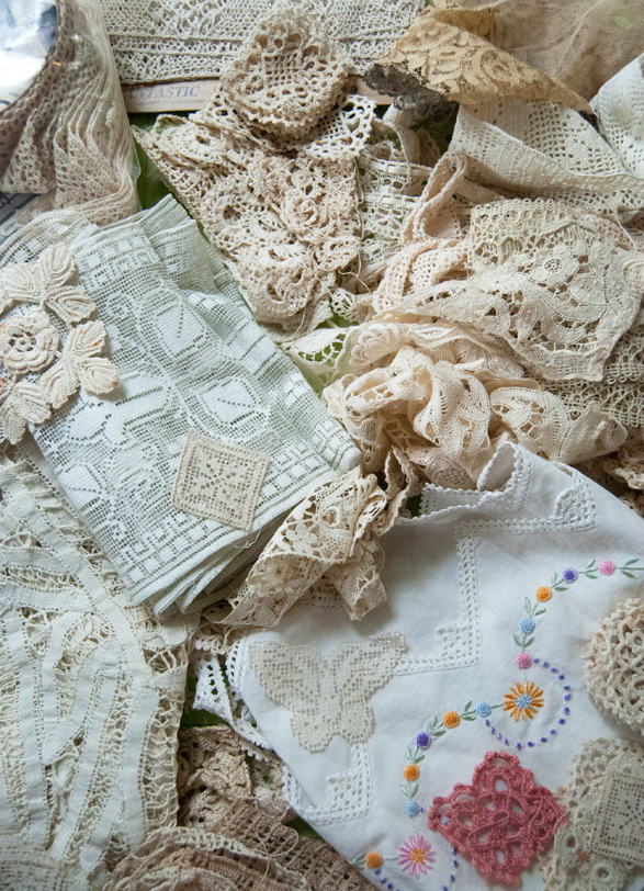 Photo of a pile of Vintage handmade lace trims and scraps