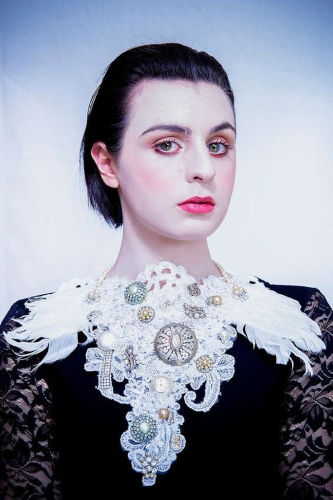 Photo of model wearing Statement Angel wing Bridal Neck Piece by Marelle Couture for Hopscotch Couture. https://hopscotchcouture.com/search?q=angel+wing+necklace&options%5Bprefix%5D=last #bridalneckpiece #angelwingnecklace #statementnecklace