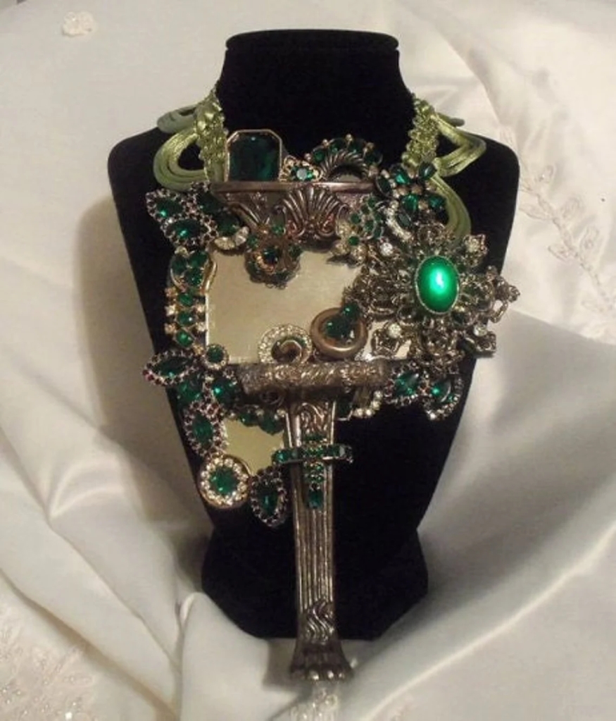 Green rhinestone mirror n legg neck piece by Marelle Couture